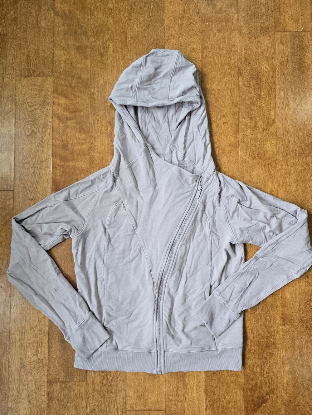 Lululemon size 8 Asymmetrical Every Journey hoodie light lilac color